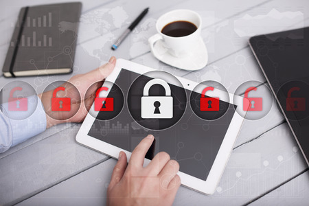 Cyber security, Data protection, information safety and encryption. internet technology and business concept.  Virtual screen with padlock icons.の写真素材