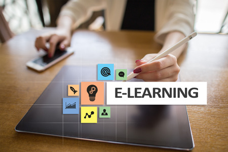 E-Learning on the virtual screen. Internet education concept.の写真素材