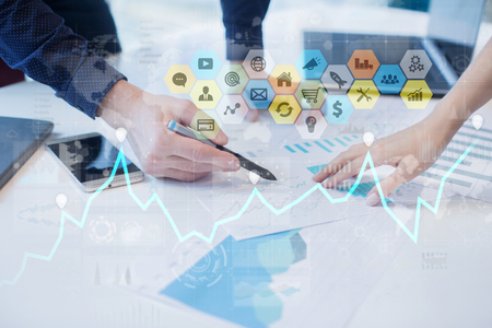 Colored applications icons and graphs on virtual screen. Business, internet and technology concept.の写真素材