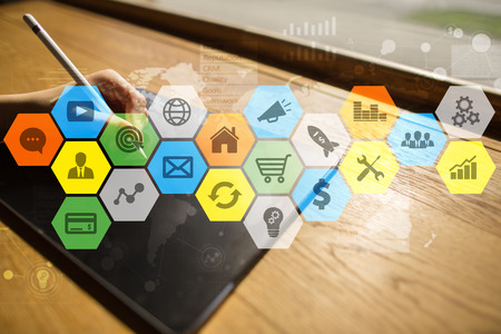 Colored applications icons and graphs on virtual screen. Business, internet and technology concept.の写真素材