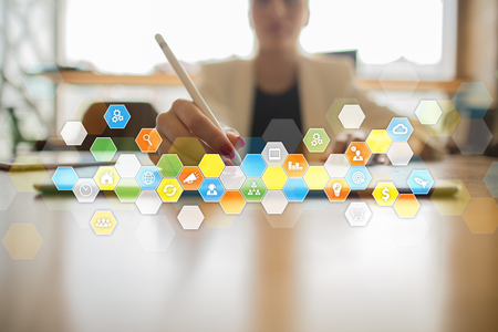 Colored applications icons and graphs on virtual screen. Business, internet and technology concept.の写真素材