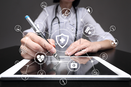 Medicine doctor with modern computer, virtual screen interface and icon medical network connection....