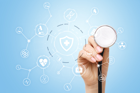 Medicine doctor with modern computer, virtual screen interface and icon medical network connection. medical technology network and health care concept.の写真素材