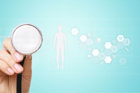 Doctor using modern computer with Medical record diagram on virtual screen concept. Health monitoring application.の写真素材