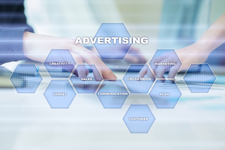 Avertising, marketing strategy. Icons and graphs on virtual screen. Business, internet and technology concept.の写真素材