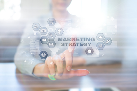 Marketing strategy concept on virtual screen. Internet, advertising and digital technology concept. Sales growth.の写真素材