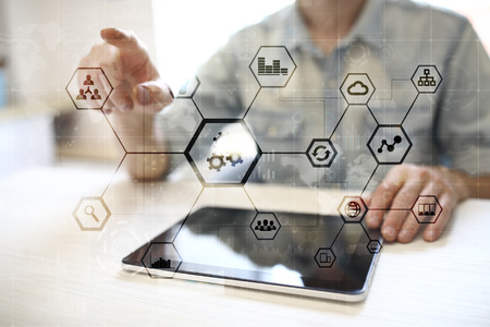 IOT and Automation concept as an innovation, improving productivity, reliability and repeatability in technology and business processes.の写真素材