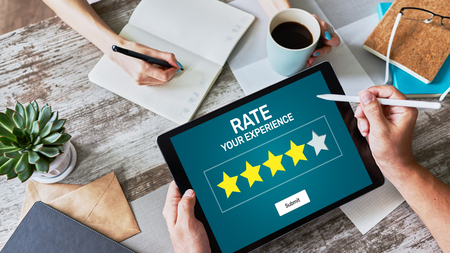 Rate customer experience review. Service and Customer satisfaction. Five Stars rating. Business internet and technology concept.の写真素材