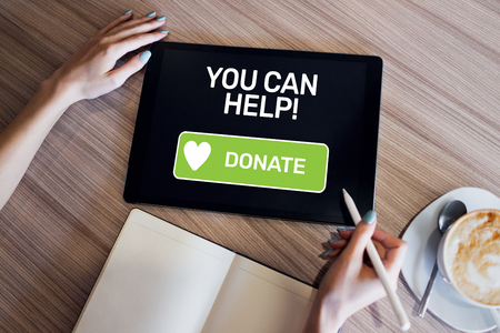 Help and donation button on device screen.