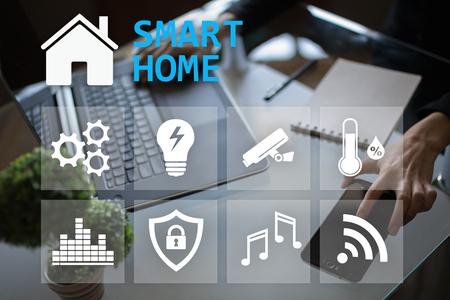 Smart home digital interface on virtual screen. Internet and automation technology concept.の写真素材