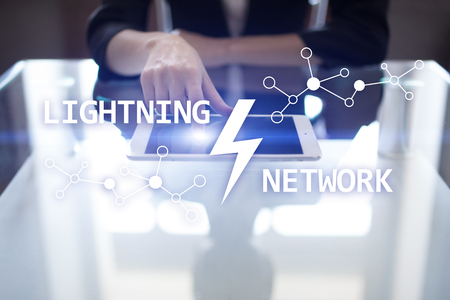 Lightning network - second layer payment protocol that operates on top of a blockchain. Bitcoin, cryptocurrency, internet payment.の写真素材