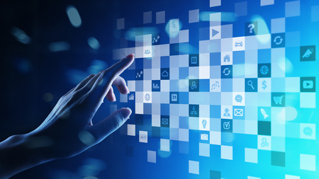Application icons on virtual screen. Technology and business concept.