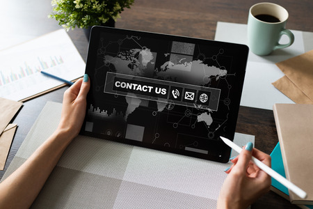 Contact us field and button on screen. Business concept.