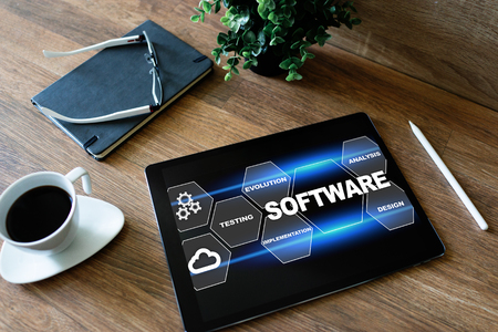 Software development and process automation concept on tablet computer screen.