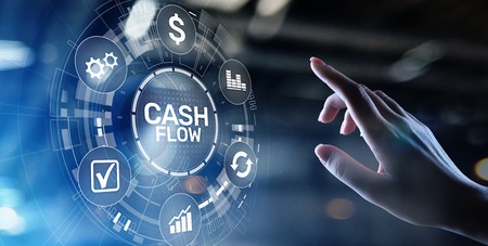 Cash flow button on virtual screen. Business Tehcnology concept.の写真素材