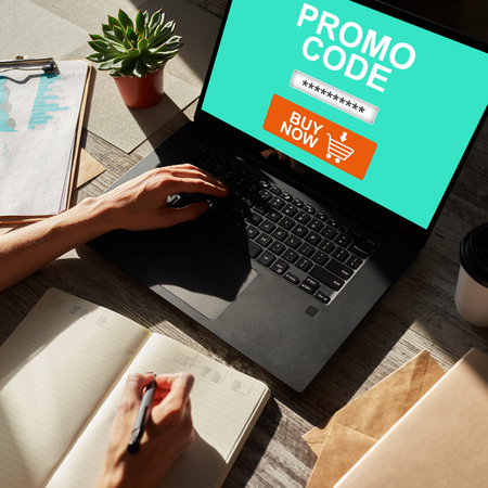 Tablet with promo code field on screen. E-commerce, mobile marketing concept.の写真素材