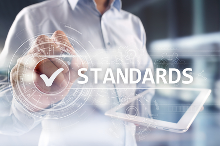 Standards, Quality Control, Assurance, ISO, Checkbox on virtual screen.の写真素材