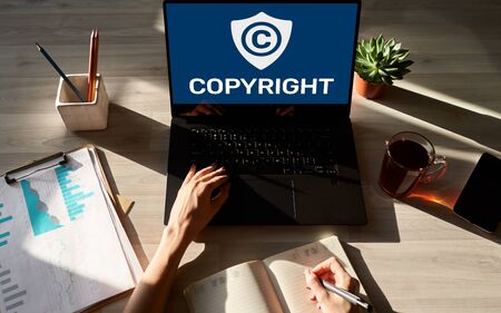 Copyright icon on screen. Patent Law and Intellectual Property. Business, Internet and Technology Concept.の写真素材