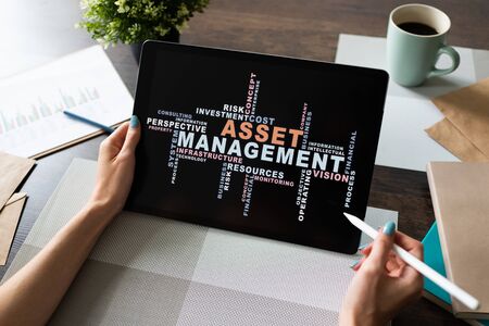 Asset management words cloud on screen. FInancial and Business concept.の写真素材