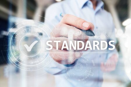 Standards, Quality Control, Assurance, ISO, Checkbox on virtual screen.の写真素材