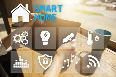 Smart home digital interface on virtual screen. Internet and automation technology concept.の写真素材