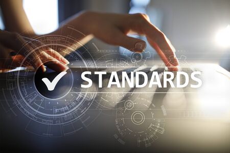 Standards, Quality Control, Assurance, ISO, Checkbox on virtual screen.の写真素材
