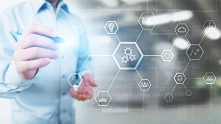 Automation of business and industrial process. Smart factory and technology innovation concept on virtual screen.の写真素材