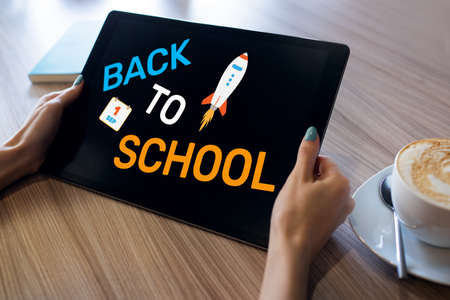 Back to school text on screen. Education and e-learning concept.の写真素材