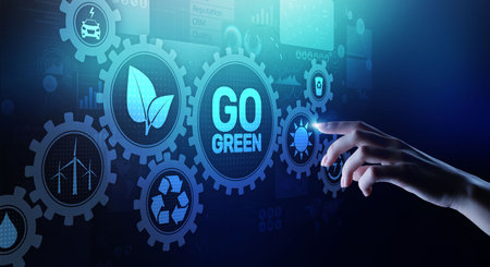 GO green eco technology ecology earth planet saving alternative energy. Button on virtual screen.の写真素材