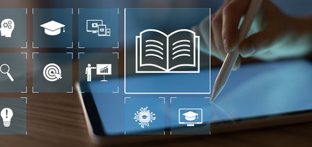 Digital Learning and Educational Resources Accessed on a Touchscreen Device in a Modern Environment.の写真素材