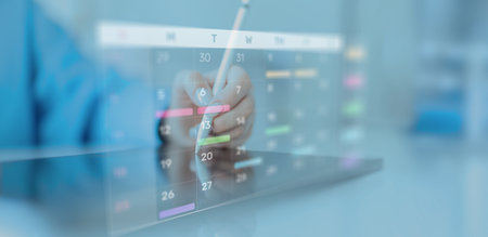 Project Management and Schedule Planning Displayed on a Digital Calendar Interface.の写真素材