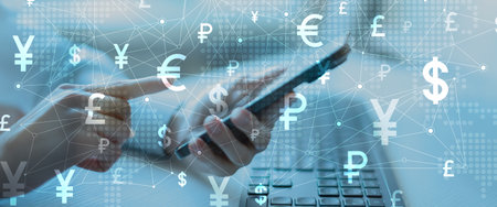 Global Currency Symbols Network Interface on Digital Tablet in Financial Technology Environment.の写真素材