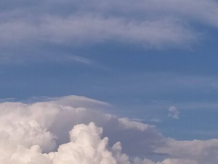Blue sky background with clouds. White clouds.