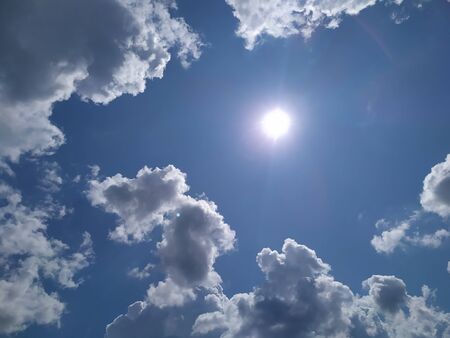 Blue sky background with clouds. White clouds.