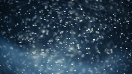 Snow white background. Christmas snowy winter design. White falling snowflakes, bokeh, abstract landscape.の素材