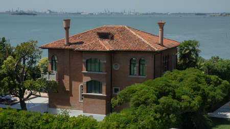 VENICE, ITALY- JULY 1, 2019. The premises of the luxurious JW MARRIOTT hotel. The hotel is situated on  on the private island of Isola delle Rose in Venice. Tourism.のeditorial素材