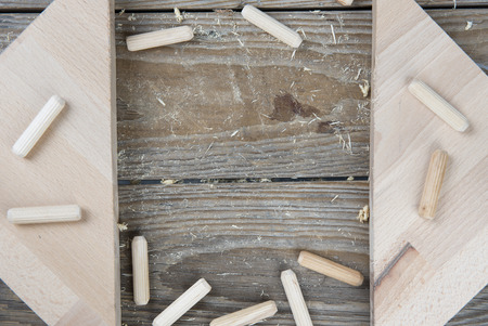 wooden background with small toolsの写真素材