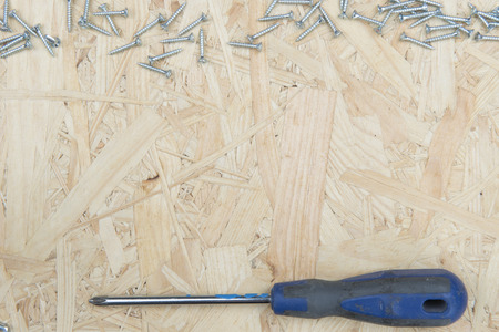 wooden background with small toolsの写真素材