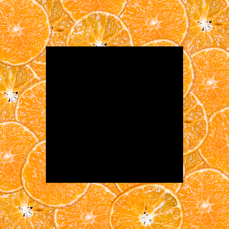 frame of fresh fruit on a black background, with space for textの写真素材