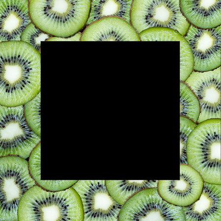 frame of fresh fruit on a black background, with space for textの写真素材