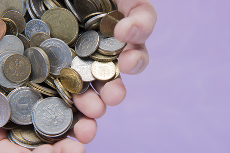 hand with money on a natural backgroundの写真素材