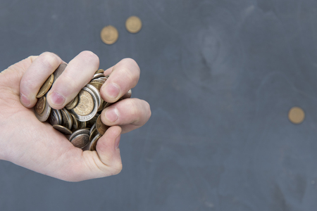 hand with money on a natural backgroundの写真素材