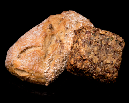 scorched roll on a black isolated background