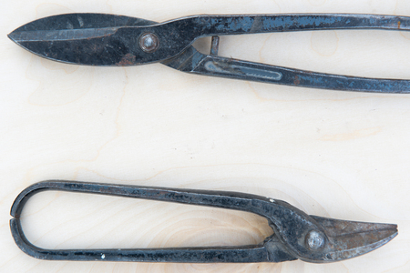old tools on a natural wooden background