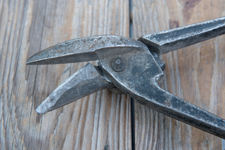 old tools on a natural wooden backgroundの写真素材