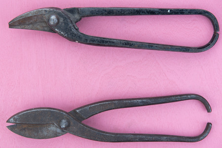 old tools on a natural wooden background