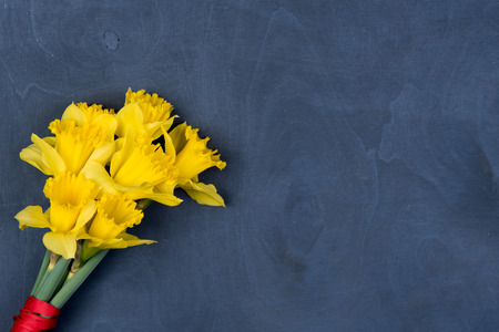 Easter background with flowers and natural woodの写真素材