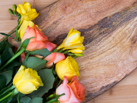 Easter background with flowers and natural wood