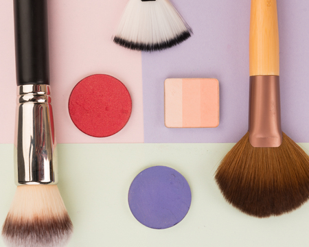 make-up brushes on colored backgroundsの写真素材
