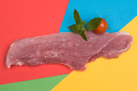 raw pork on colored backgroundsの写真素材